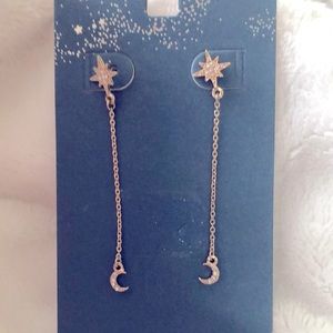 Star and moon earrings with diamond accents